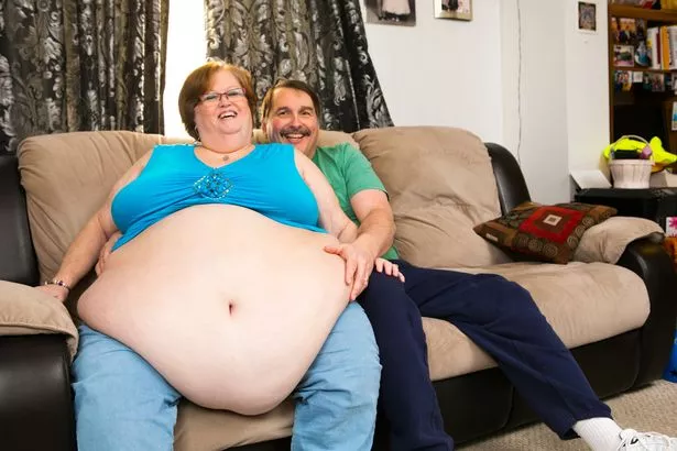 Gayla Neufeld, 52, who is using her 96 inch belly to entice men from around the world, including devoted hubby, Lance